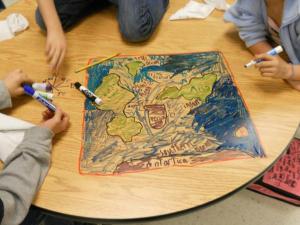 kids drawing map on table 